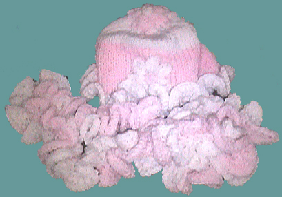 Knitted ruffled hat and scarf with flowers